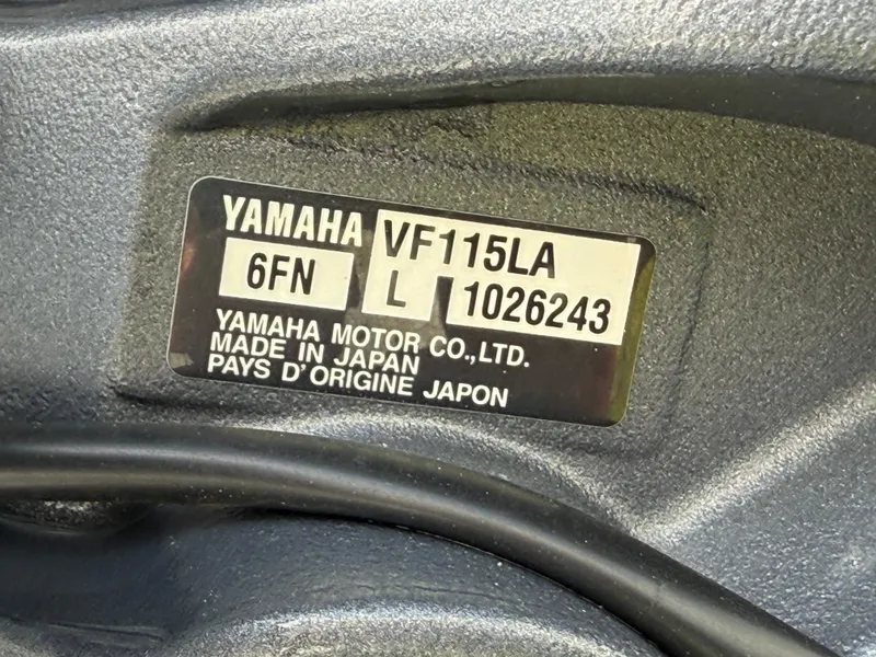 Slide: The Image of Yamaha VF115LA engine label, made in Japan, model 6FN, serial number 1026243. - 15