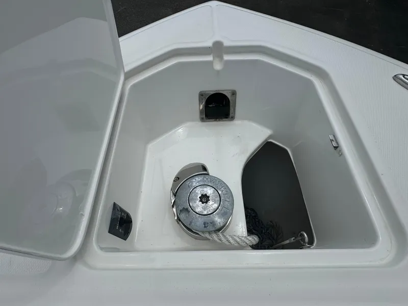 Slide: The Image of 2019 Albemarle 27 DC anchor locker with winch and rope storage. - 9