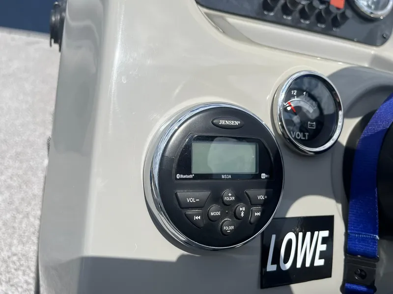 Slide: The Image of Control panel of 2019 Lowe Ultra 182 Fish & Cruise boat with radio and voltmeter. - 15