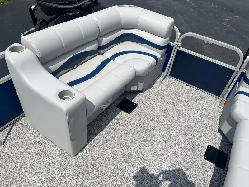 Slide: The Image of 2019 Lowe Ultra 182 Fish & Cruise boat interior with gray and blue seating. - 19