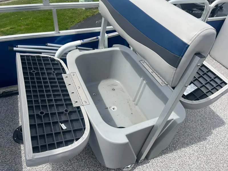 Slide: The Image of 2019 Lowe Ultra 182 Fish & Cruise boat seat with storage compartment open. - 20