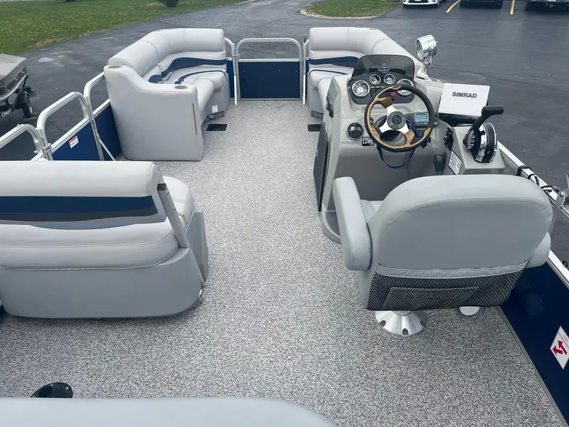 Slide: The Image of 2019 Lowe Ultra 182 Fish & Cruise boat interior with seating and steering console. - 8
