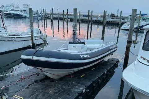 The Image of 2017 Williams Jet Tenders Sportjet 520 docked at marina during sunset. - 0
