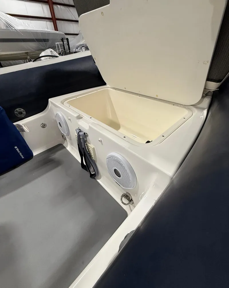 Slide: The Image of 2017 Williams Jet Tenders Sportjet 520 interior with open storage compartment. - 12
