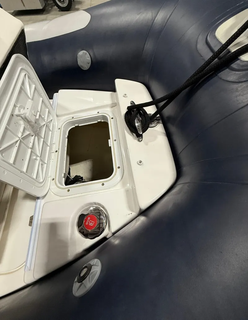 Slide: The Image of 2017 Williams Jet Tenders Sportjet 520, open storage compartment, sleek design, durable materials. - 15