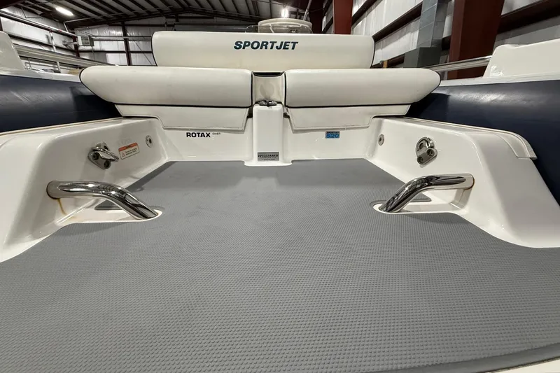 Slide: The Image of 2017 Williams Jet Tenders Sportjet 520 interior with Rotax engine, sleek design, and modern features. - 17