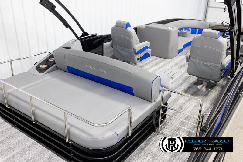 Slide: The Image of 2025 Bennington 25 LTSBSE pontoon boat interior with gray and blue seating. - 11
