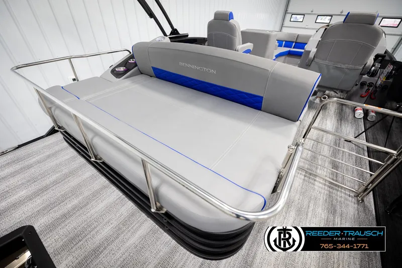 Slide: The Image of 2025 Bennington 25 LTSBSE pontoon boat interior with gray and blue seating. - 19