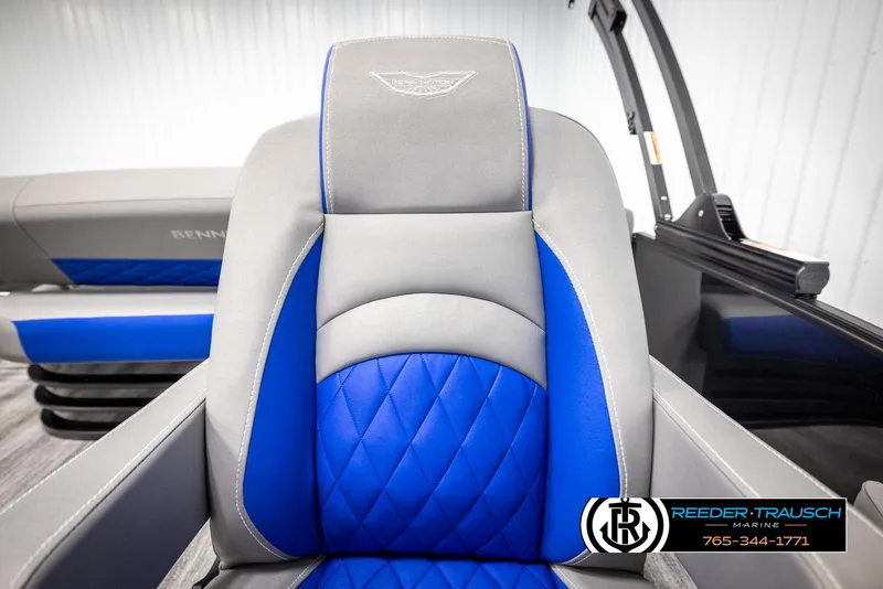 Slide: The Image of 2025 Bennington 25 LTSBSE boat seat with blue and gray upholstery, Reeder-Trausch Marine logo. - 31