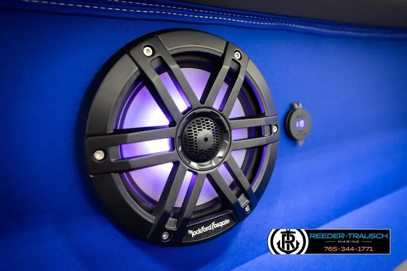 Slide: The Image of Speaker with purple LED on 2025 Bennington 25 LTSBSE boat, blue interior. - 34