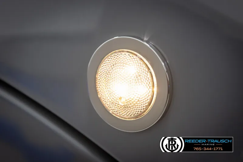 Slide: The Image of Close-up of a 2025 Bennington 25 LTSBSE boat light, featuring a sleek design. - 37