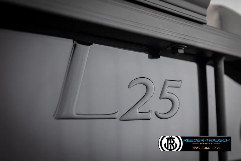 Slide: The Image of 2025 Bennington 25 LTSBSE boat with "L25" emblem, Reeder-Trausch Marine branding. - 41