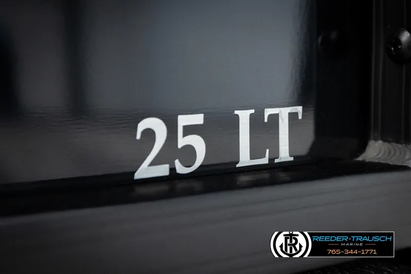 Slide: The Image of 2025 Bennington 25 LTSBSE boat model logo on a dark surface. - 42