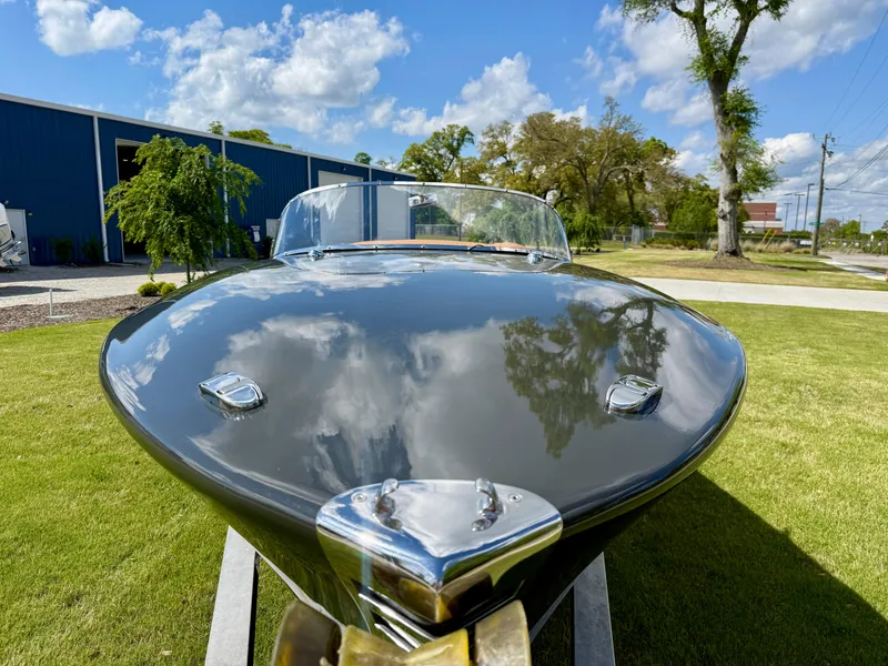 Slide: The Image of 2019 Seven Seas Yachts Hermes Speedster, sleek design, parked on grass under blue sky. - 14