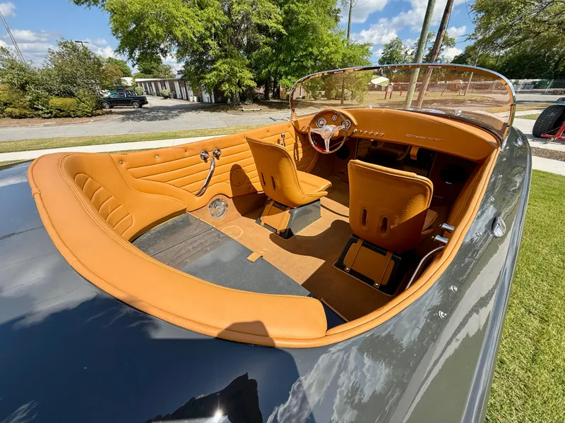 Slide: The Image of 2019 Seven Seas Yachts Hermes Speedster with luxurious tan interior, parked outdoors. - 5