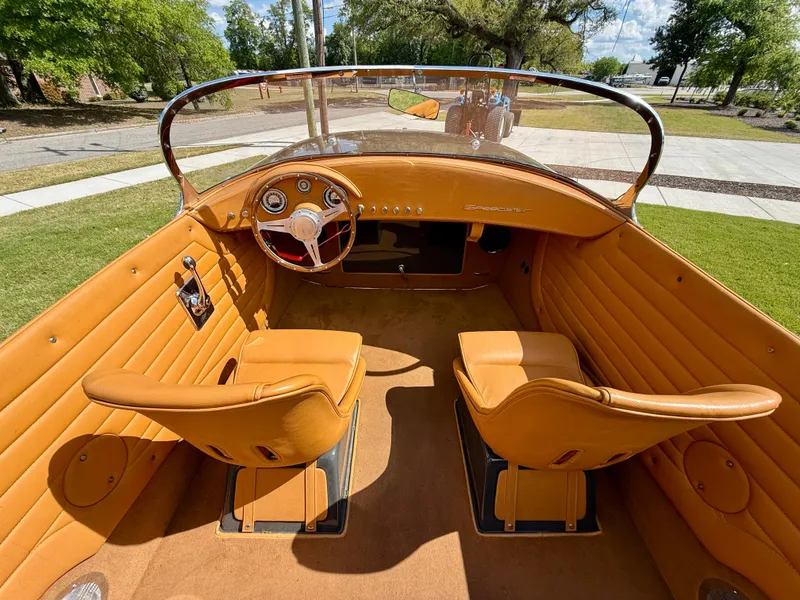 Slide: The Image of Interior of 2019 Seven Seas Yachts Hermes Speedster with tan leather seats and classic dashboard. - 7