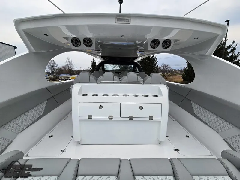 Slide: The Image of 2023 Mystic Powerboats M5200 interior with luxurious seating and modern design features. - 28