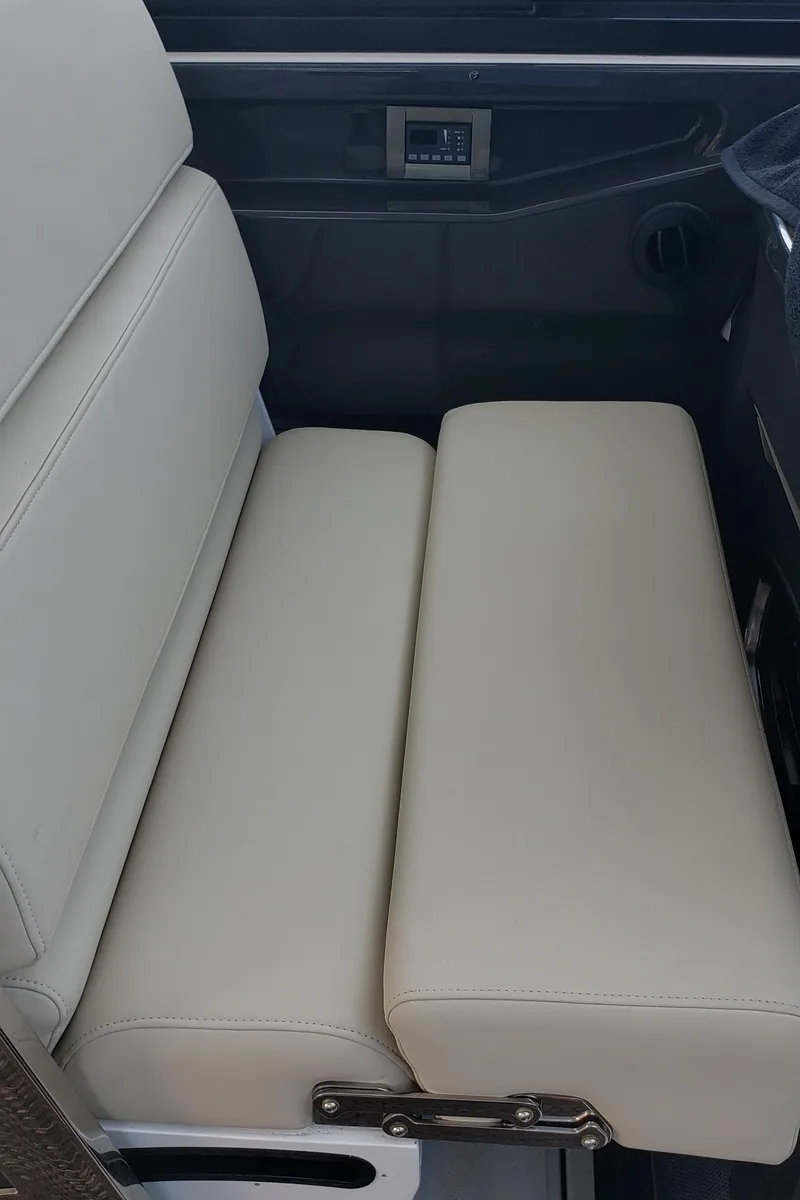 Slide: The Image of 2016 Monterey 360 Sport Coupe interior seating, beige upholstery, modern design. - 15