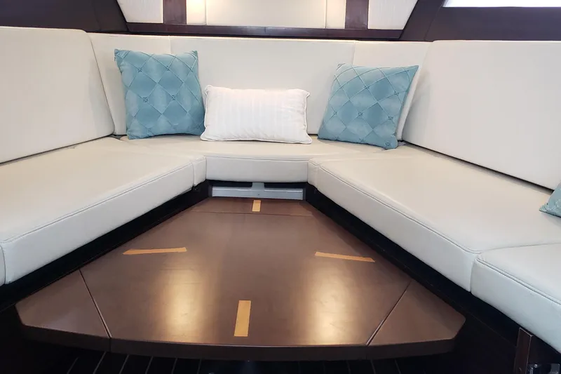 Slide: The Image of Interior of 2016 Monterey 360 Sport Coupe with elegant seating and decorative cushions. - 31