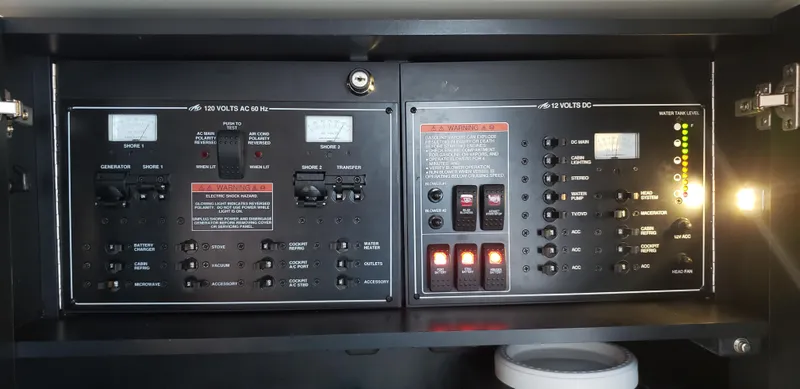 Slide: The Image of Electrical control panel in a 2016 Monterey 360 Sport Coupe boat. - 35