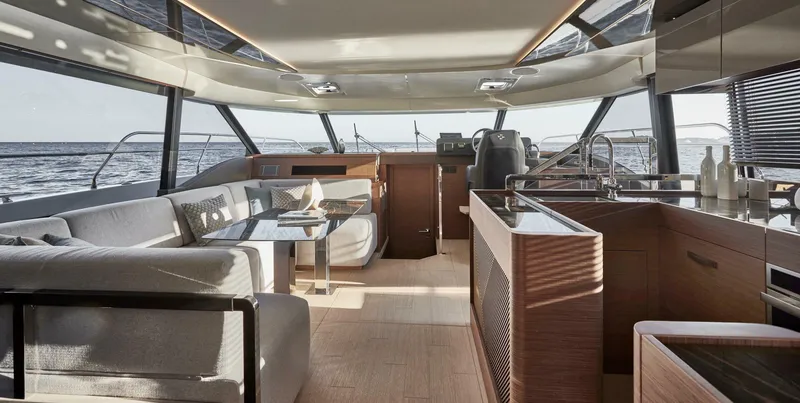 Slide: The Image of Luxurious interior of 2025 Prestige M48 yacht with modern furnishings and ocean view. - 11