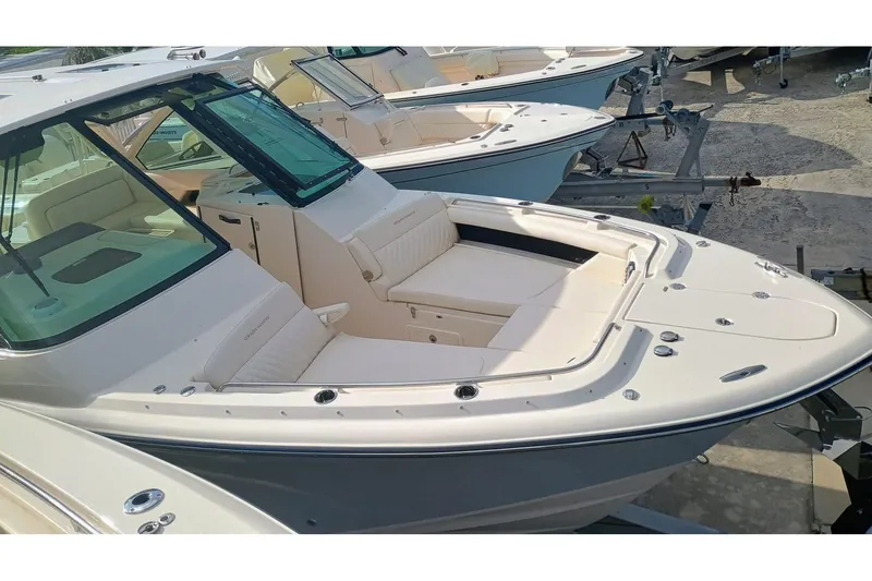 Slide: The Image of 2025 Grady-White Freedom 345 boat with spacious seating and sleek design. - 5