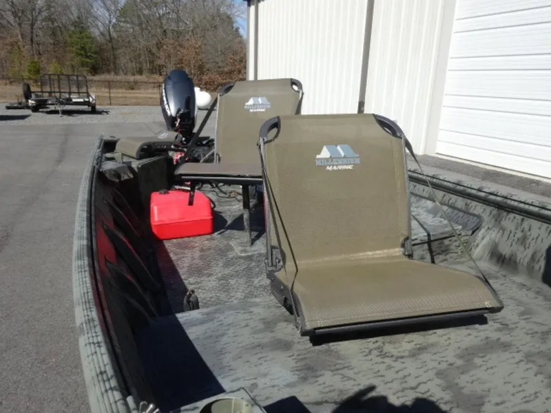 Slide: The Image of 2014 War Eagle 1542 boat with two seats and an outboard motor. - 7