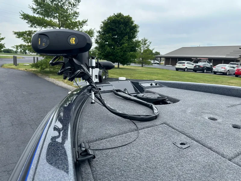 Slide: The Image of 2025 Phoenix 819 ZXL boat deck with mounted equipment, parked outdoors. - 11