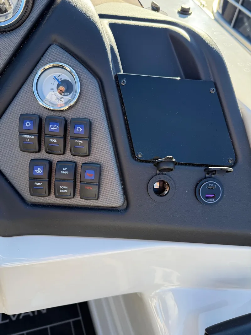 Slide: The Image of Control panel of 2025 Sylvan L-3 LZ boat with switches and gauges. - 22