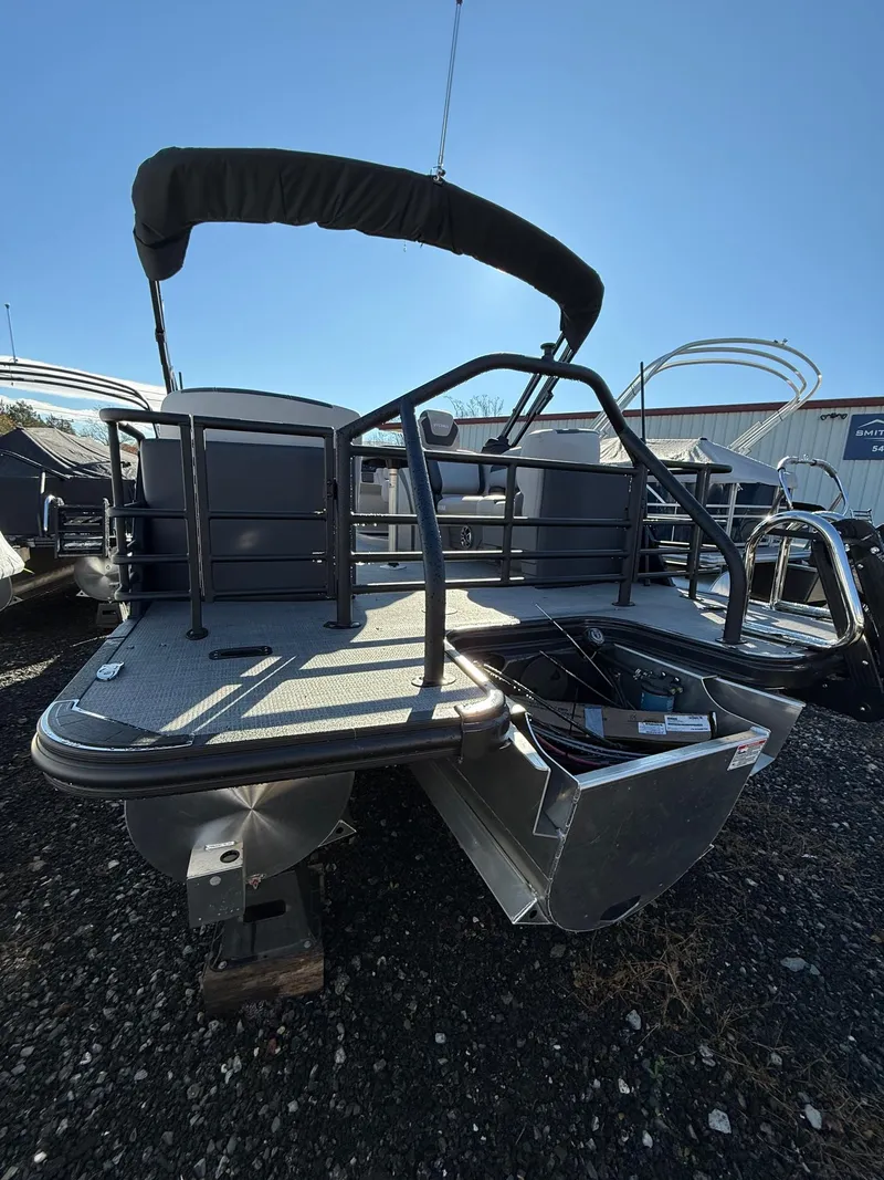 Slide: The Image of 2025 Sylvan L-3 LZ pontoon boat with sleek design and modern features. - 26