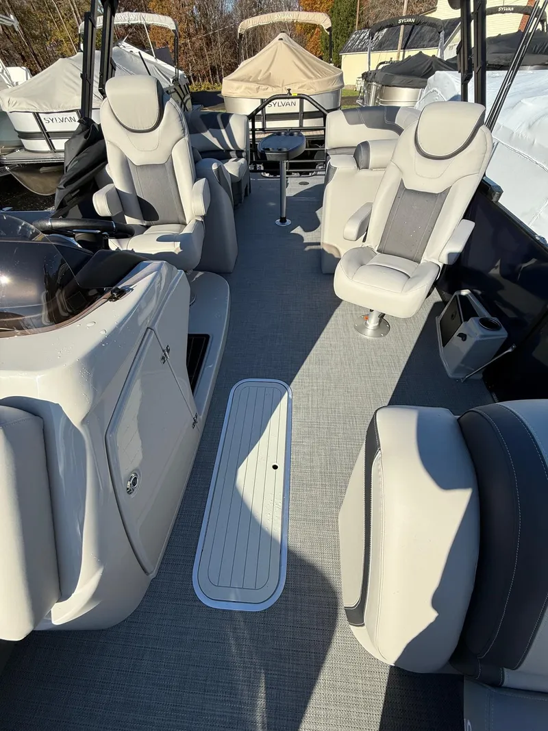 Slide: The Image of Luxurious 2025 Sylvan L-3 LZ boat interior with plush seating and modern design. - 4