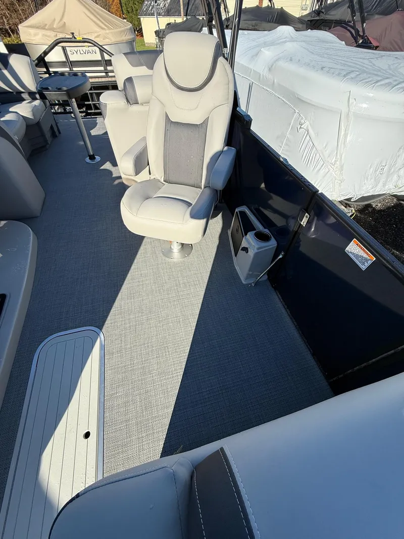 Slide: The Image of 2025 Sylvan L-3 LZ boat interior with plush seating and modern design. - 5