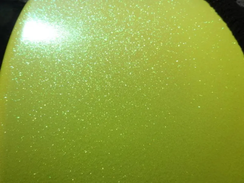 Slide: The Image of Sparkling yellow metallic paint on 2018 Tigé Z3 boat surface. - 15