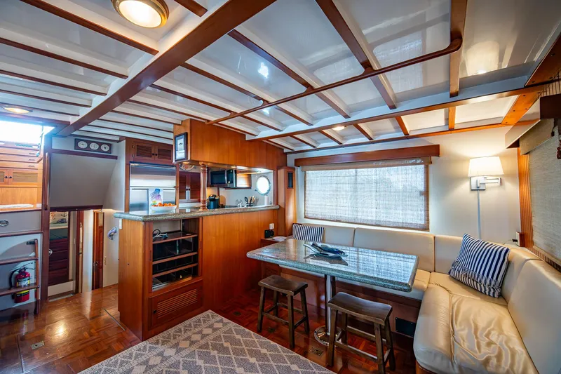 Slide: The Image of Luxurious interior of 2000 Kadey-Krogen 48 North Sea yacht with elegant wood finishes. - 11