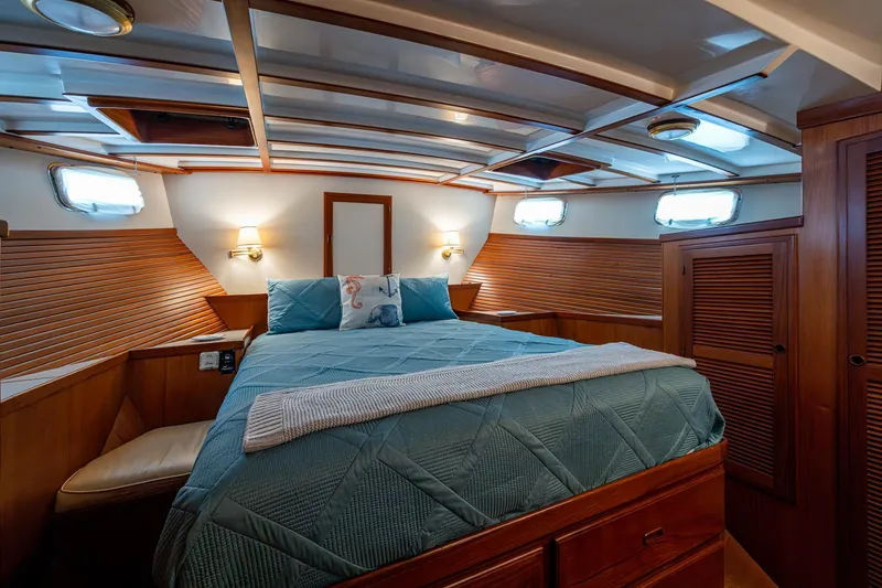 Slide: The Image of Luxurious cabin interior of 2000 Kadey-Krogen 48 North Sea yacht with cozy bedding. - 32