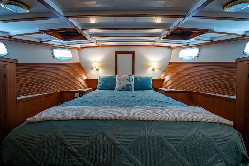 Slide: The Image of Luxurious cabin interior of 2000 Kadey-Krogen 48 North Sea yacht with cozy bedding. - 33