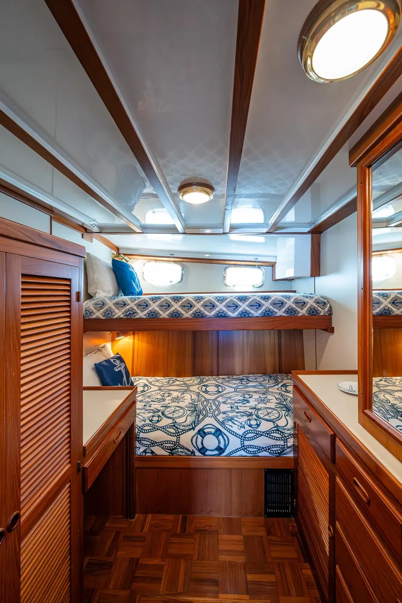 Slide: The Image of Cozy cabin interior of 2000 Kadey-Krogen 48 North Sea yacht with wooden furnishings. - 43