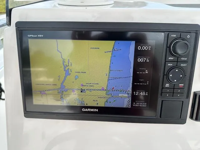 Slide: The Image of Garmin GPS display on 2018 Release 232 RX Center Console boat. - 16