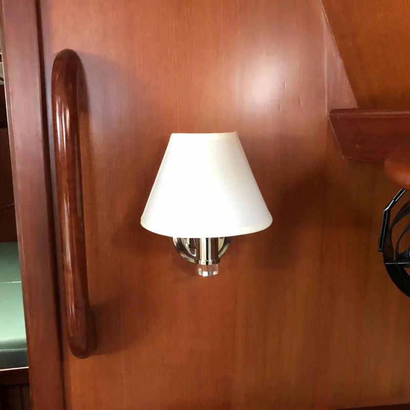Slide: The Image of Wall-mounted lamp on wooden interior of 2000 Outbound 44 yacht. - 13