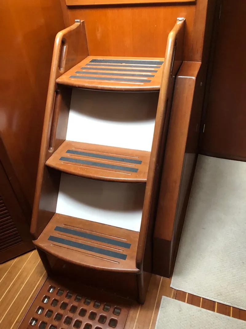 Slide: The Image of Wooden interior stairs on a 2000 Outbound 44 yacht. - 47