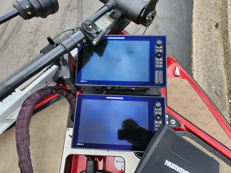 Slide: The Image of 2020 Vexus VX20 boat with dual Humminbird fish finders on the dashboard. - 19