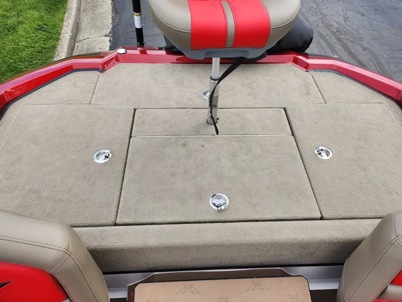 Slide: The Image of 2020 Vexus VX20 boat deck with beige upholstery and red accents. - 24