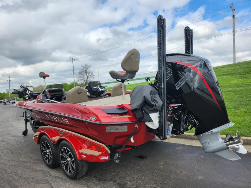 Slide: The Image of 2020 Vexus VX20 boat with dual seats and powerful outboard motor on a trailer. - 3