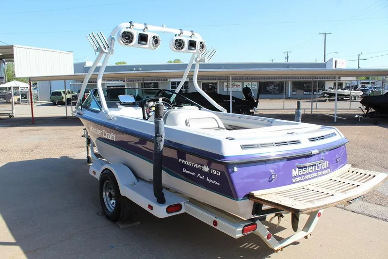 Slide: The Image of 1994 MasterCraft 190 Pro Star boat with speakers and wakeboard tower. - 6