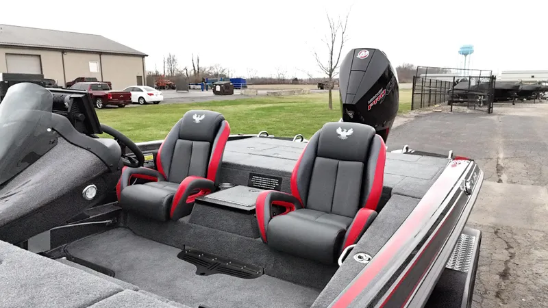 Slide: The Image of 2025 Phoenix 721 ZXL boat with dual seats and powerful outboard motor. - 14