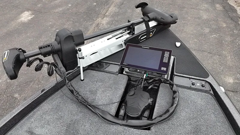 Slide: The Image of 2025 Phoenix 721 ZXL boat with advanced navigation system and trolling motor. - 15