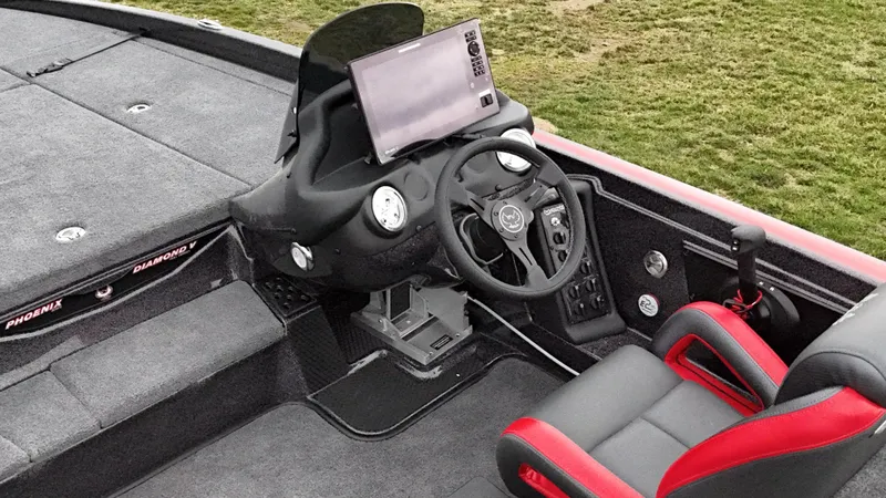 Slide: The Image of 2025 Phoenix 721 ZXL boat cockpit with steering wheel, dashboard, and seating. - 16