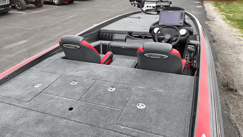 Slide: The Image of 2025 Phoenix 721 ZXL boat interior with dual seats and advanced dashboard. - 19