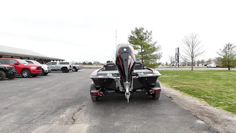 Slide: The Image of 2025 Phoenix 721 ZXL boat on trailer in parking lot. - 3