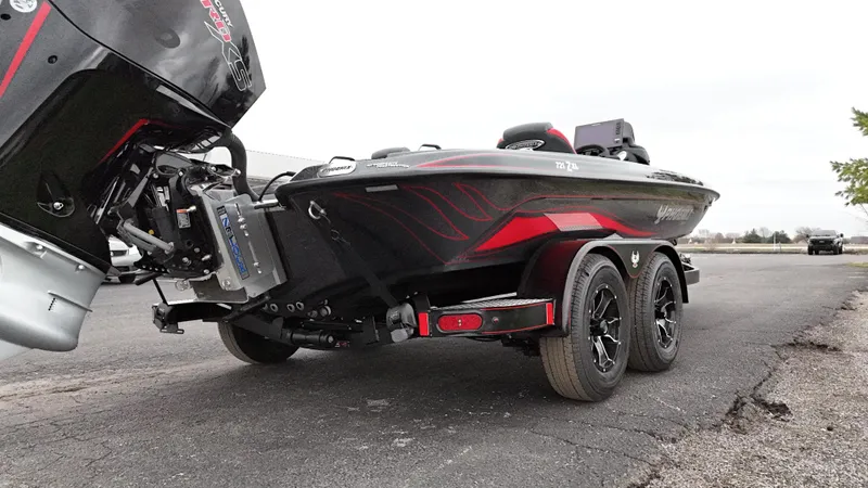 Slide: The Image of 2025 Phoenix 721 ZXL boat on trailer, featuring sleek design and powerful engine. - 8